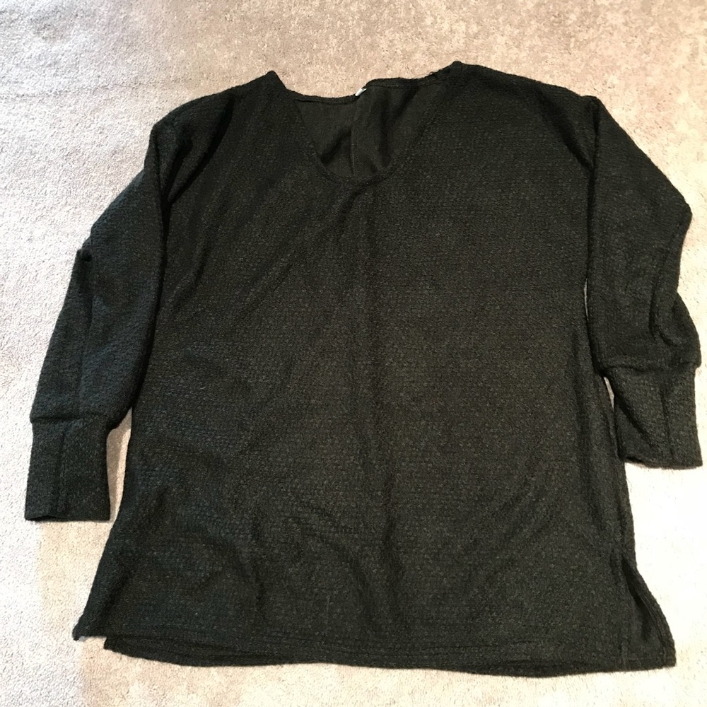 V-neck sweater. Never been worn!